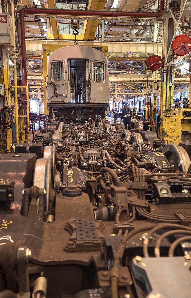Riham technician servicing a machine