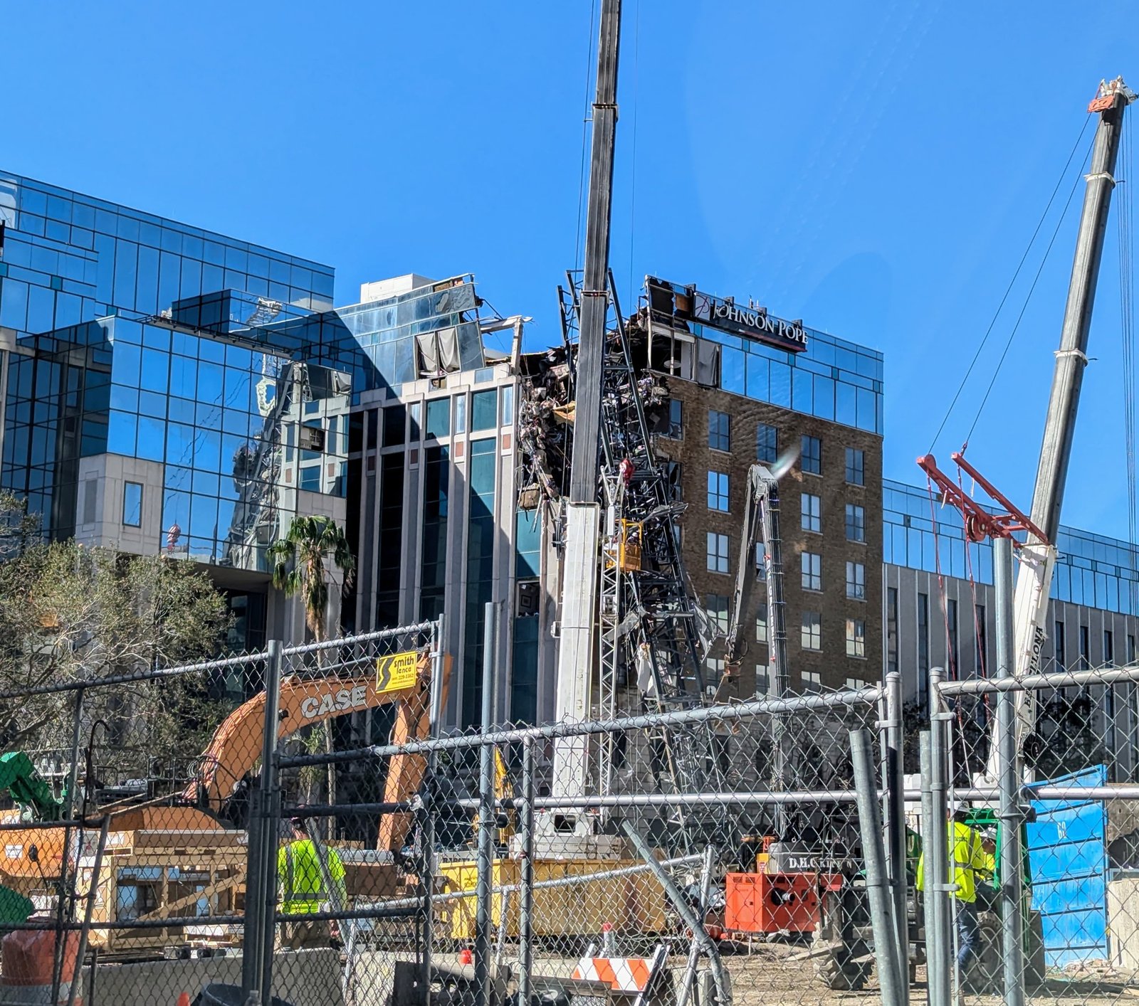 Tower cranes over a building under construction